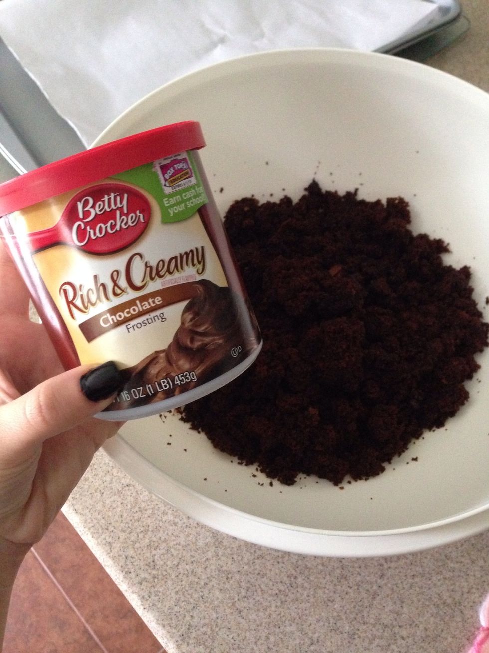 Now add your frosting. I wouldn't add the whole tub. I added about 1/4 only because my cake was pretty moist already.
