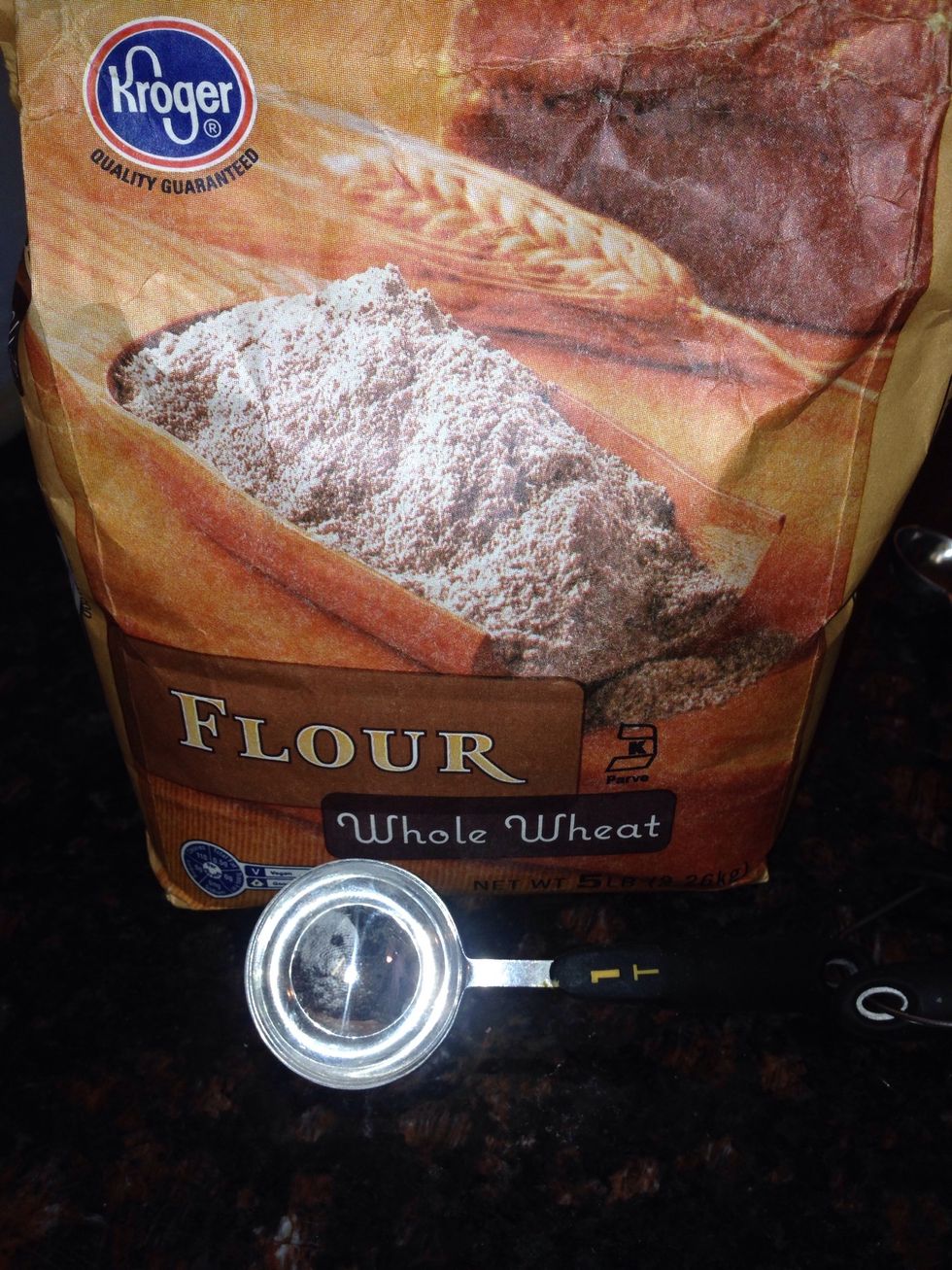 Now adding one at a time, the 3 Tbsp All Purpose Flour (I used whole wheat) to the batter all while mixer is still blending on low speed.