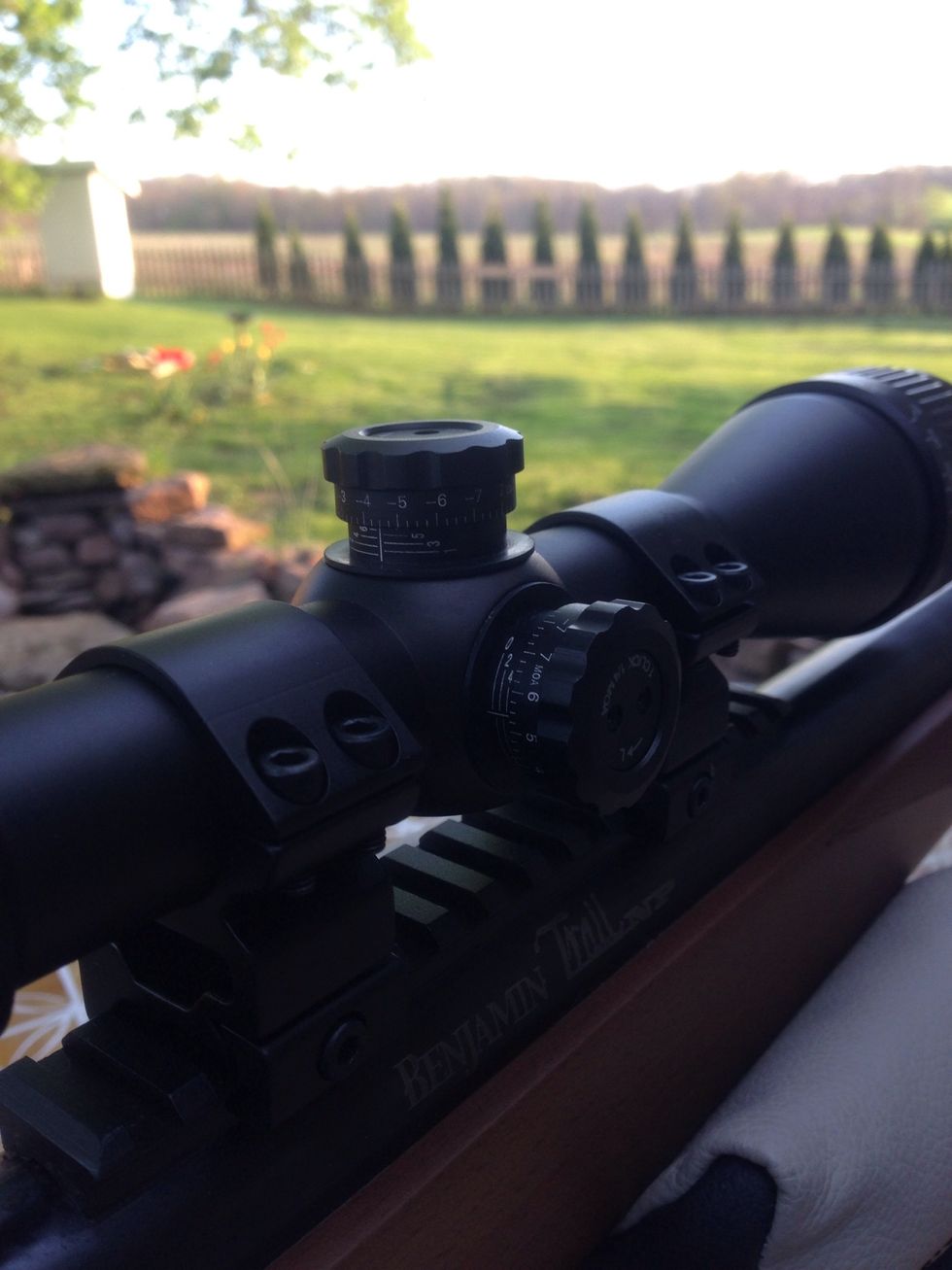 Now adjust windage and elevation knobs accordingly.