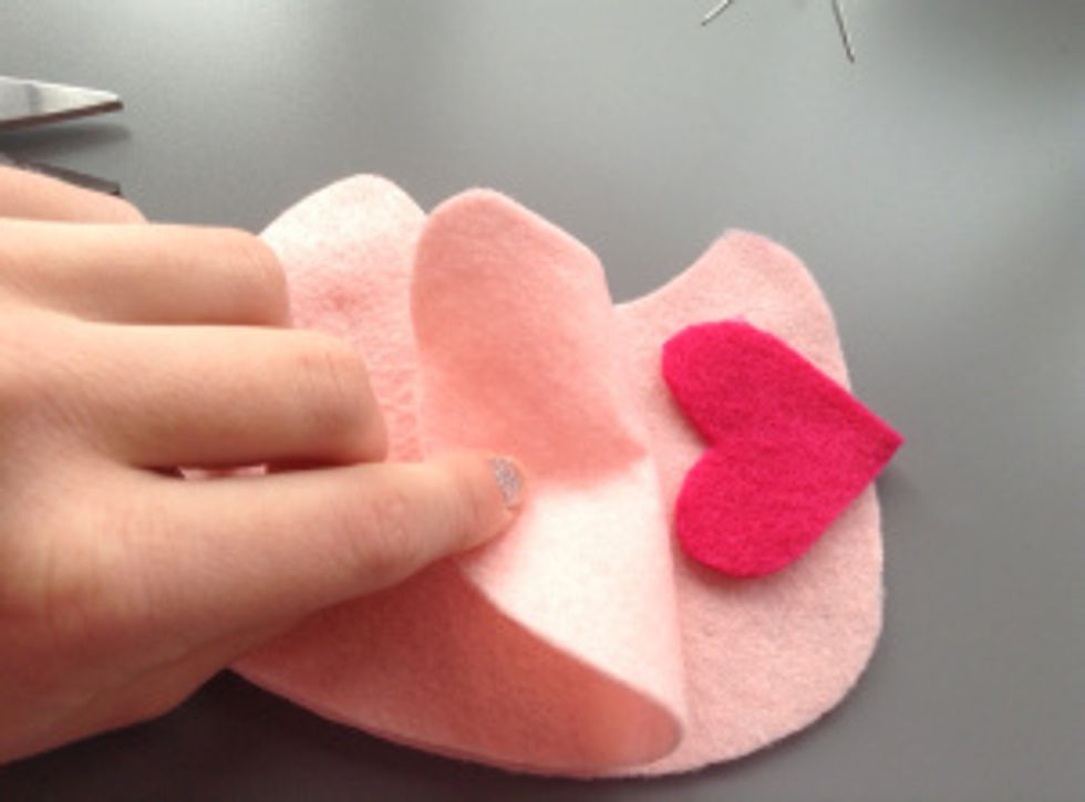 Now all of the pieces have been cut out, time to start sewing.  Sandwich the two wings between the two body pieces and pin them in place.