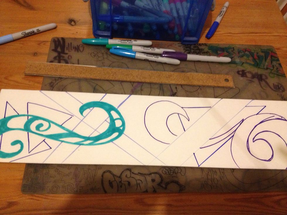 Now all you do is just start drawing different shapes with the markers. Color in some shapes and leave some blank if you wish. Feel free to use the ruler or free hand your designs. I chose both