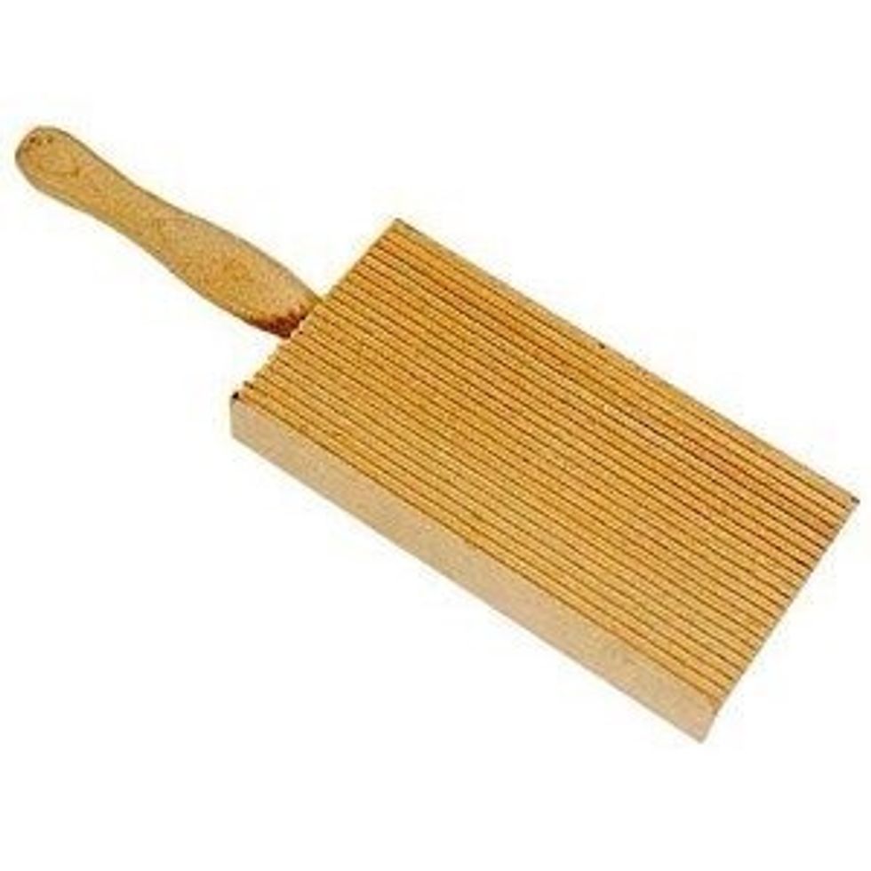 Now an easier way to do this is to use a gnocchi board. Like this. $4.00 and change. No kidding. This little item makes things a whole helluva lot easier.