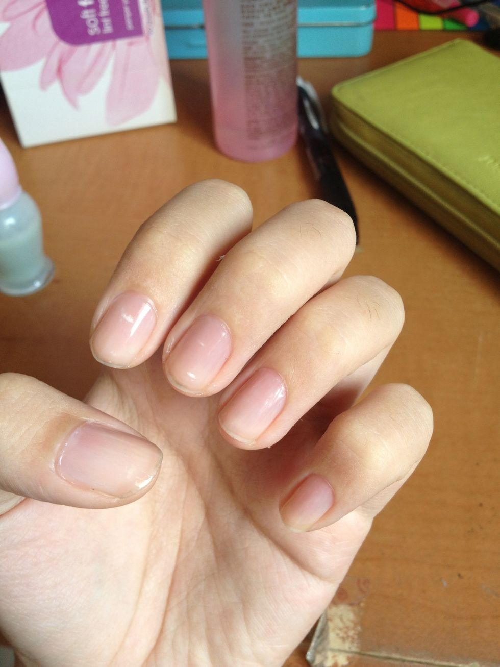 Now, apply one coat of your base polish. This helps make the nail smooth for your coloured polish to paint on later. It also protects your nail from staining.