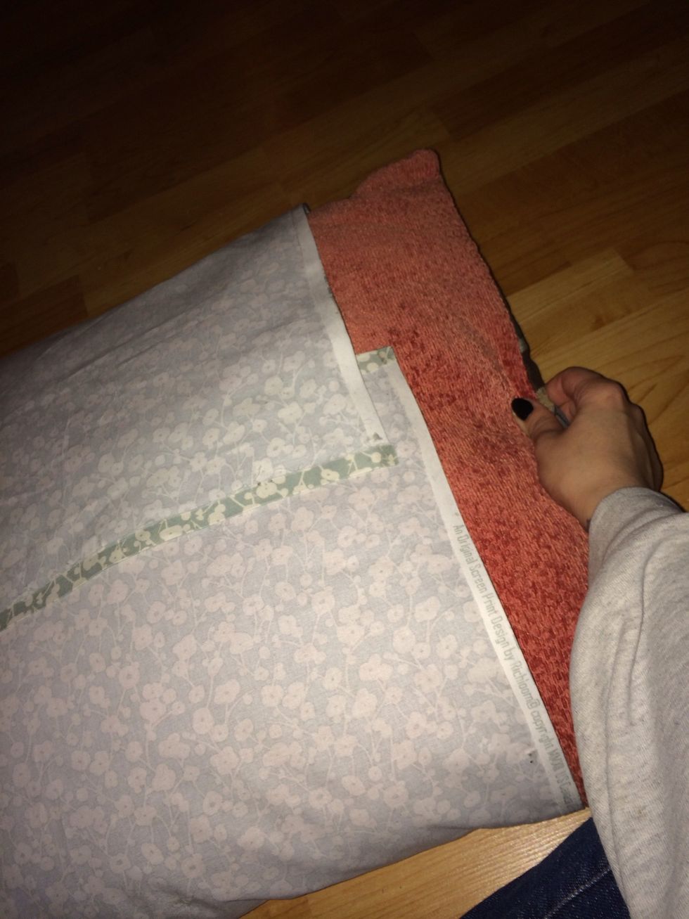 Now as best as you can and holding the other end of the fabric, pull out the pillow and try to keep your placement.
