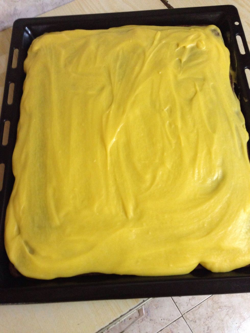 Now as the sponge has cooled completely, spread the cream over the top and take to fridge to set a little bit.