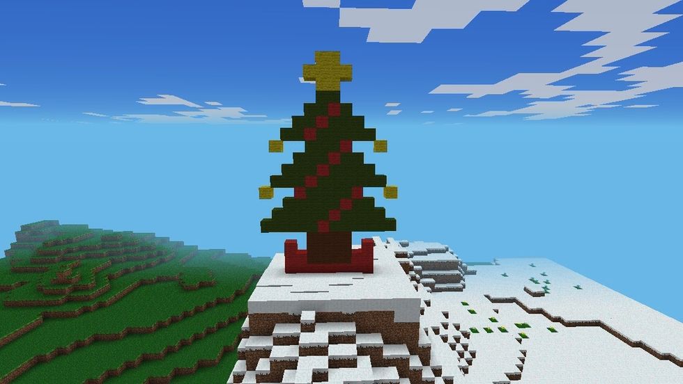 Now at the end of every long line accept from the first one, place a yellow wool block diagonally away from the first and last green block of the line. NOW YOUR DONE