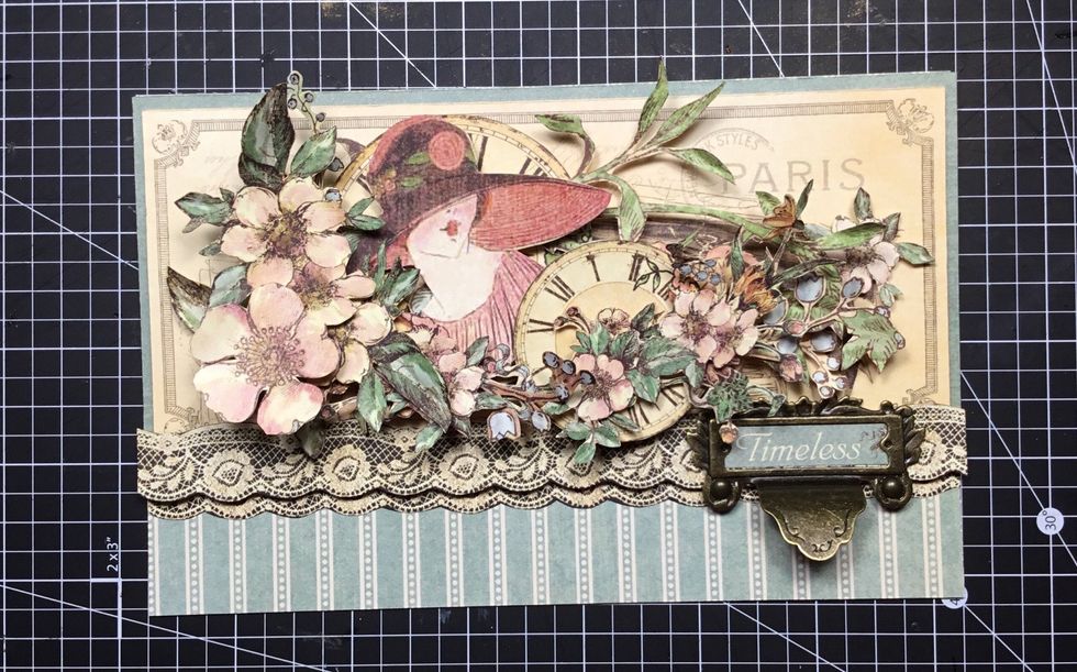 Now attach the Graphic 45 Metal Book plate as shown with the word of your choice inside. Your card is now finished \u263a\ufe0f