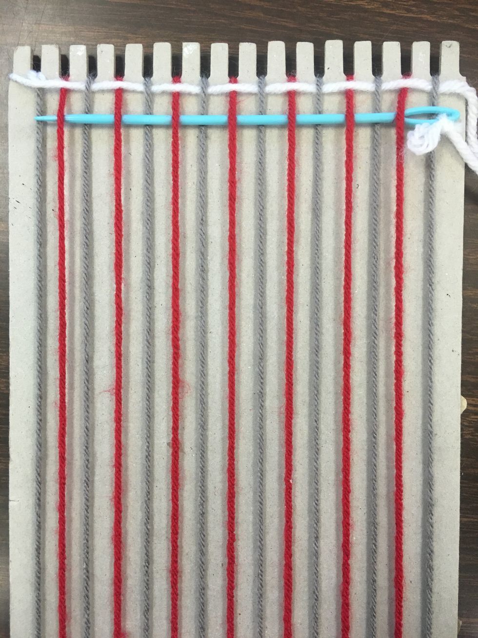 Now begin going back the other way. Be sure to wrap around your last thread, & do the opposite of the first row. See above how the red thread is now the top thread and the gray thread is the bottom.