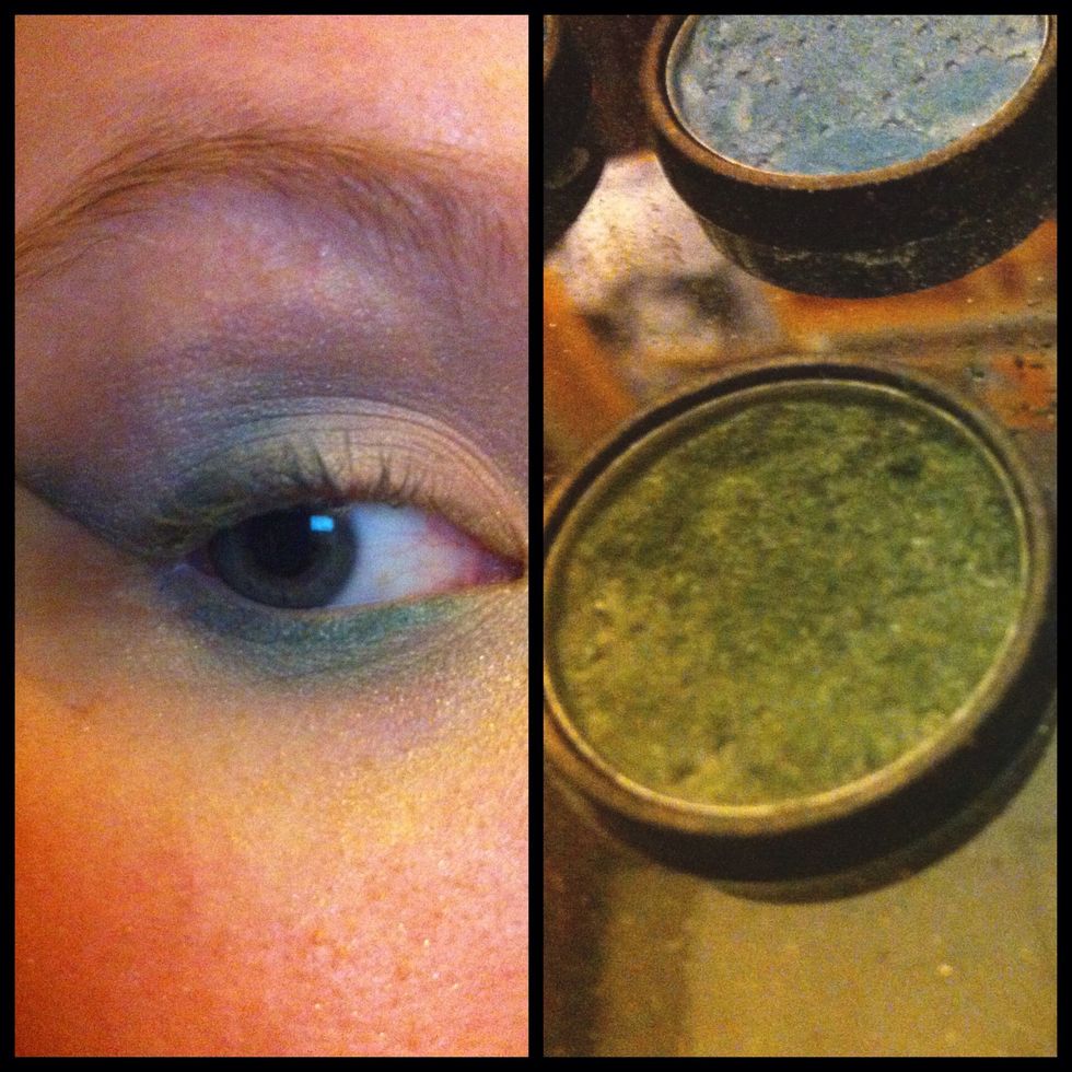 Now, blending with the deep blue on the upper outer eye and add more dimension, add a shade slightly deeper than the liner (shimmery camo green) over it at the outer corner of the lower lash line.