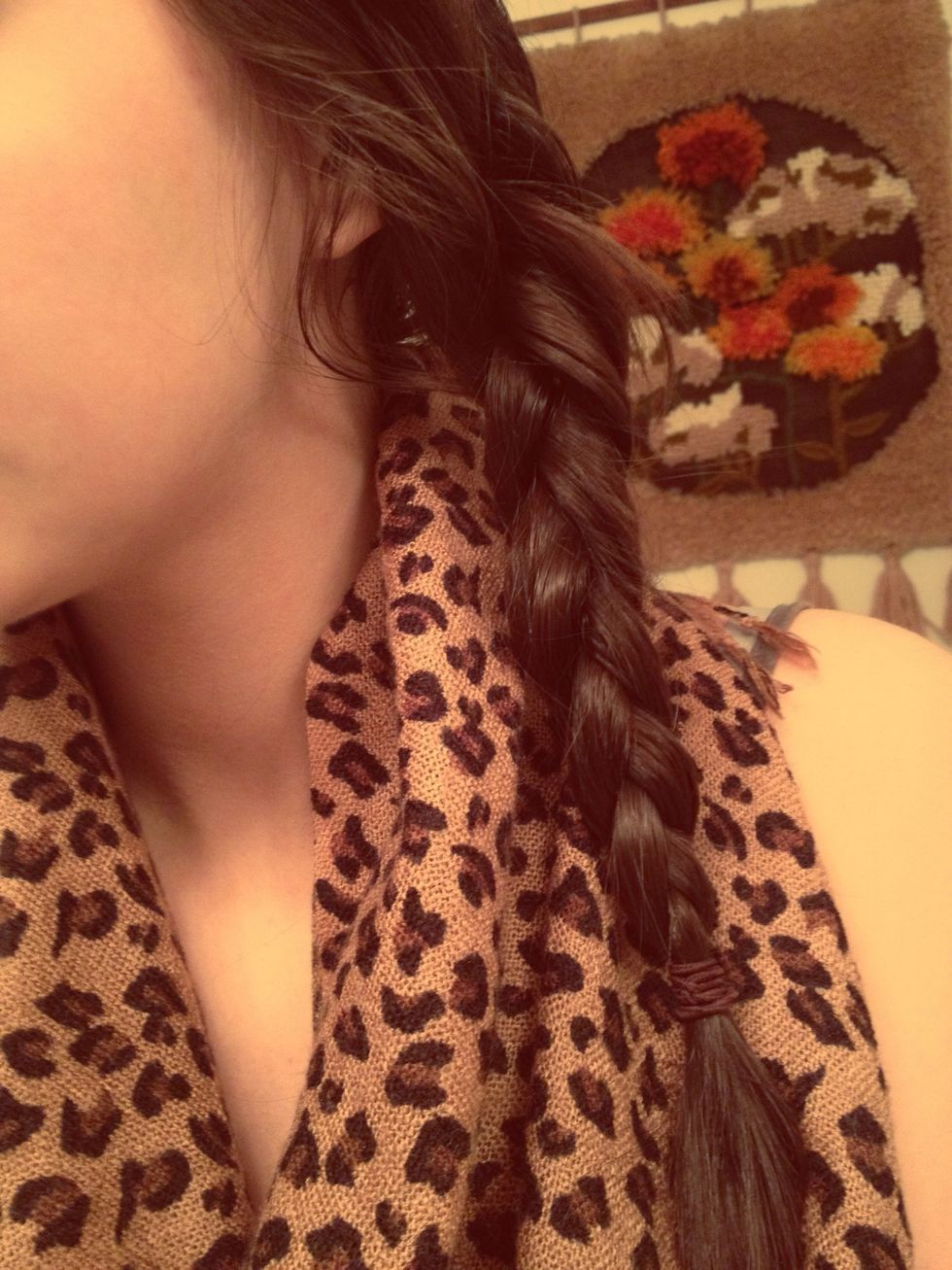 Now braid the twists like you would normally braid your hair.
