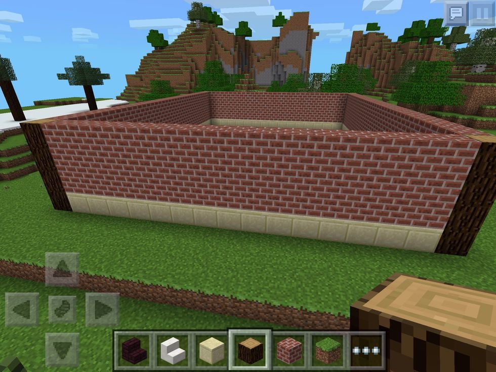Now build up the walls, a height of at least three blocks high should do! You can always make your own bigger!