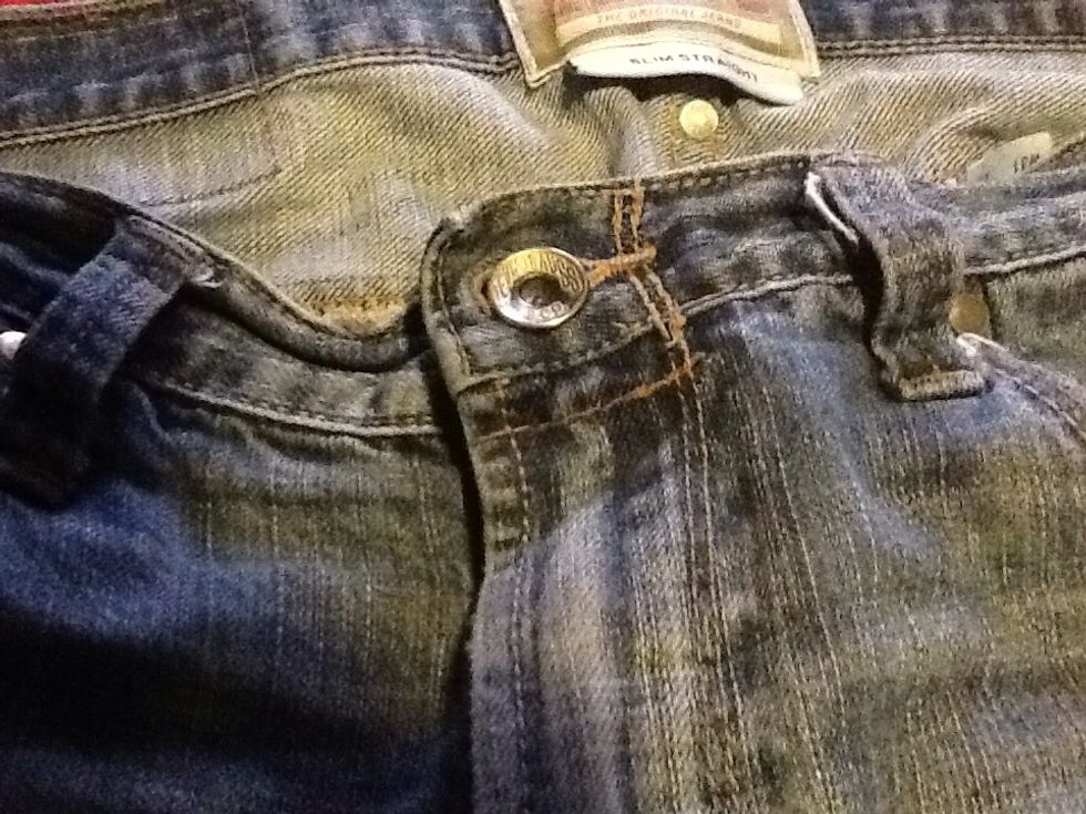 Now button your jeans, and the zipper will not run down on you any more, it will save you money and many embarrassing moments :)