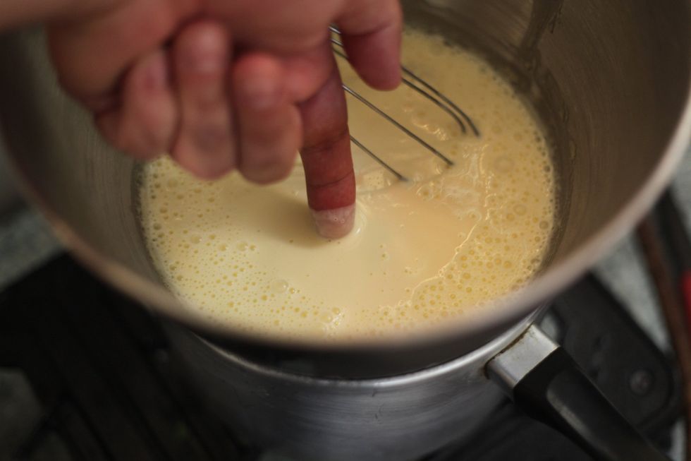 Now by the time you've chopped up the chocolate and tasted a bit here and there, stick your finger in the cream it should be just a tad warm. Just above room temperature. Now start the fire...