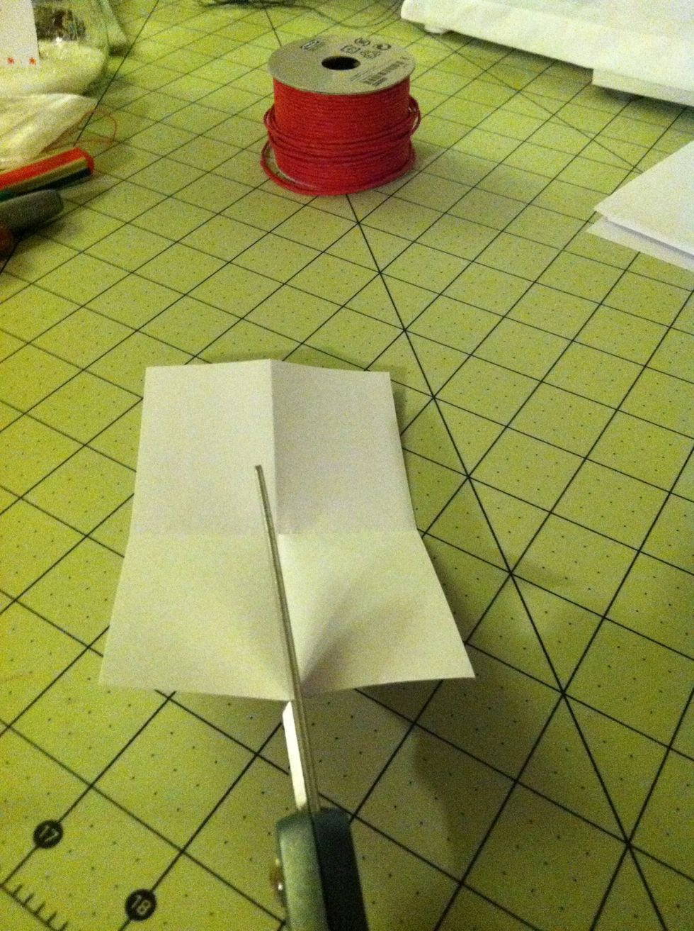 Now carefully cut along your folds.