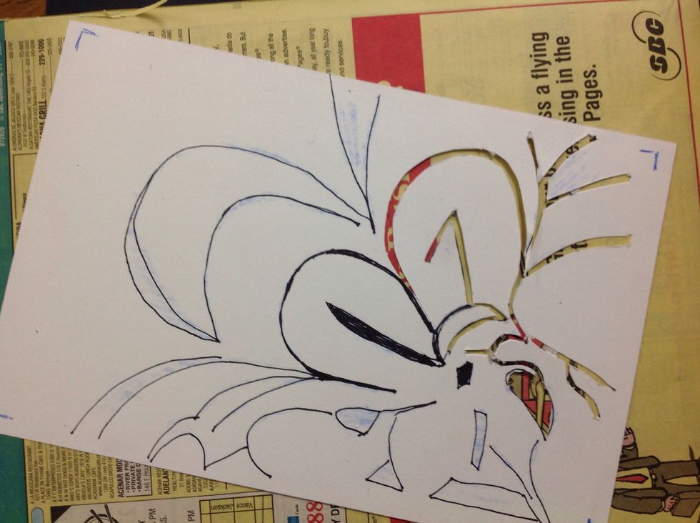 Now, carefully cut out the black lines. Do this slowly, if you cut all of the lines out, you will lose the inside of your flower. It's best to take to slow and cut away the lines a little at a time.