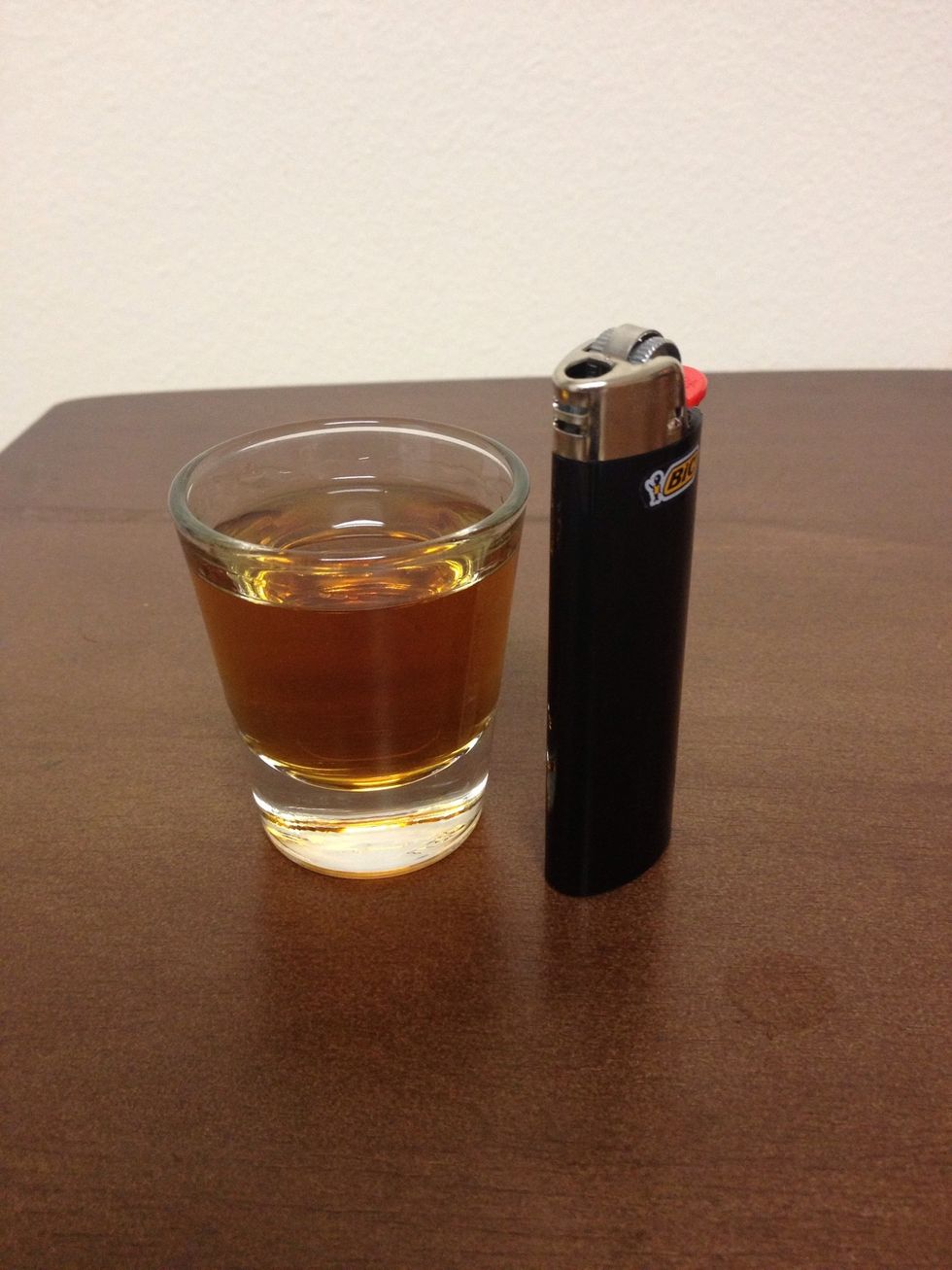 Now, CAREFULLY light the top of the shot glass.
