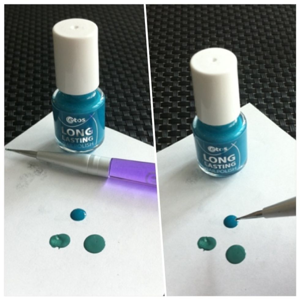 Now choose another colour and make a blob on the piece of paper. Use your dotter to dip into it.