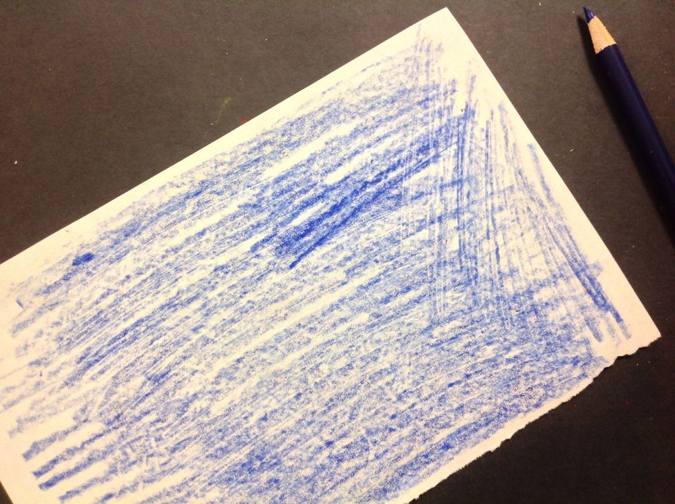 Now choose one flower to further work on and flip the drawing over and color the back loosely so that you can trace the flower.