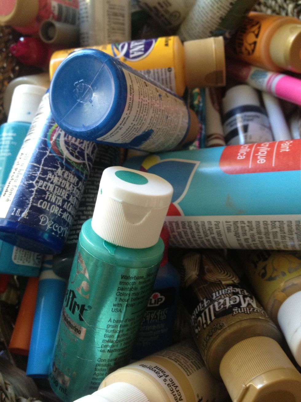 Now choose your paint color! If you're like me, you'll have plenty to choose from! I couldn't decide on one, so I painted each spoon a different color of the rainbow.