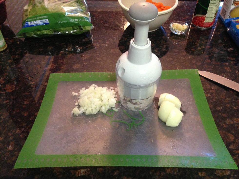 Now chop onion. I love using The Pampered Chef Food Chopper. Fast, easy & tearless!