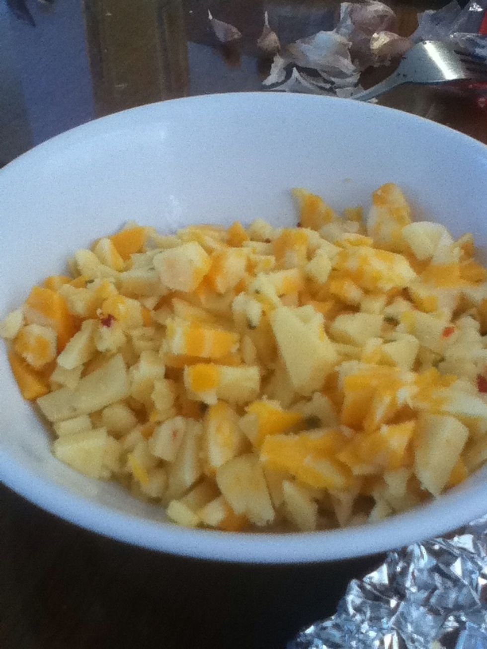 Now chop up your block of cheese like this. I actually bought two blocks of cheese and cut them in half, colby and pepper jack. You can choose whatever cheese you like.