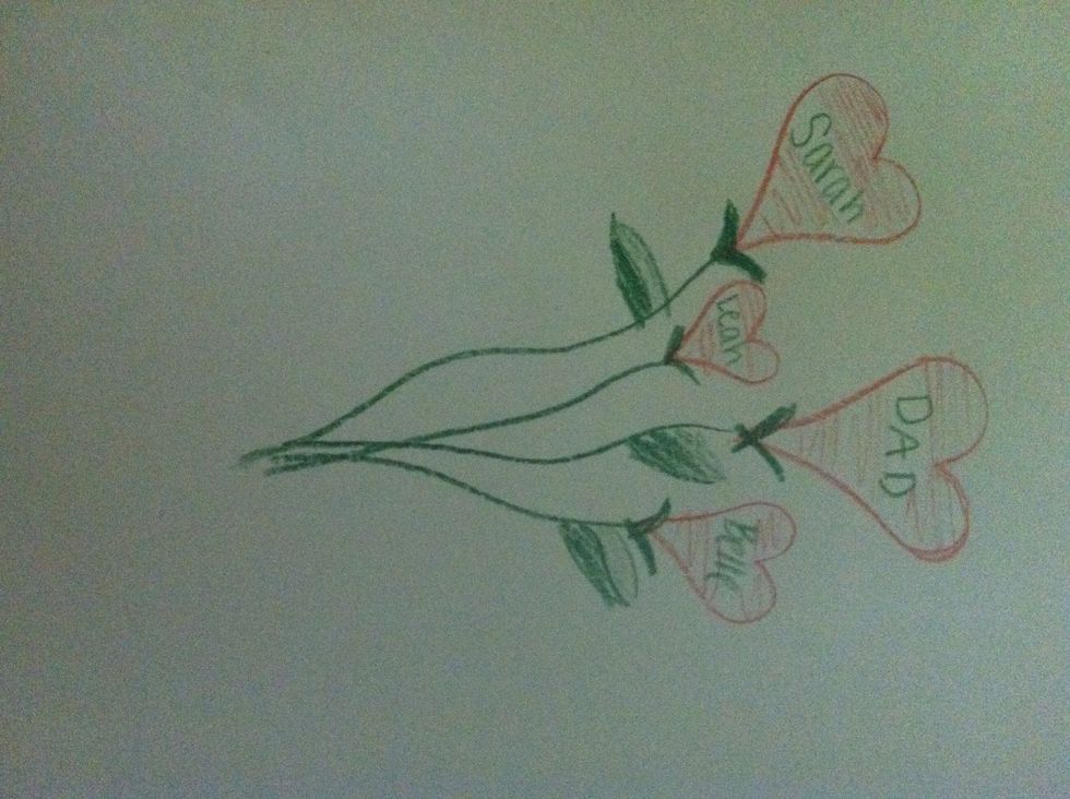 Now color the hearts in and add leaves to the stems . Now it's a bunch if flower hearts!