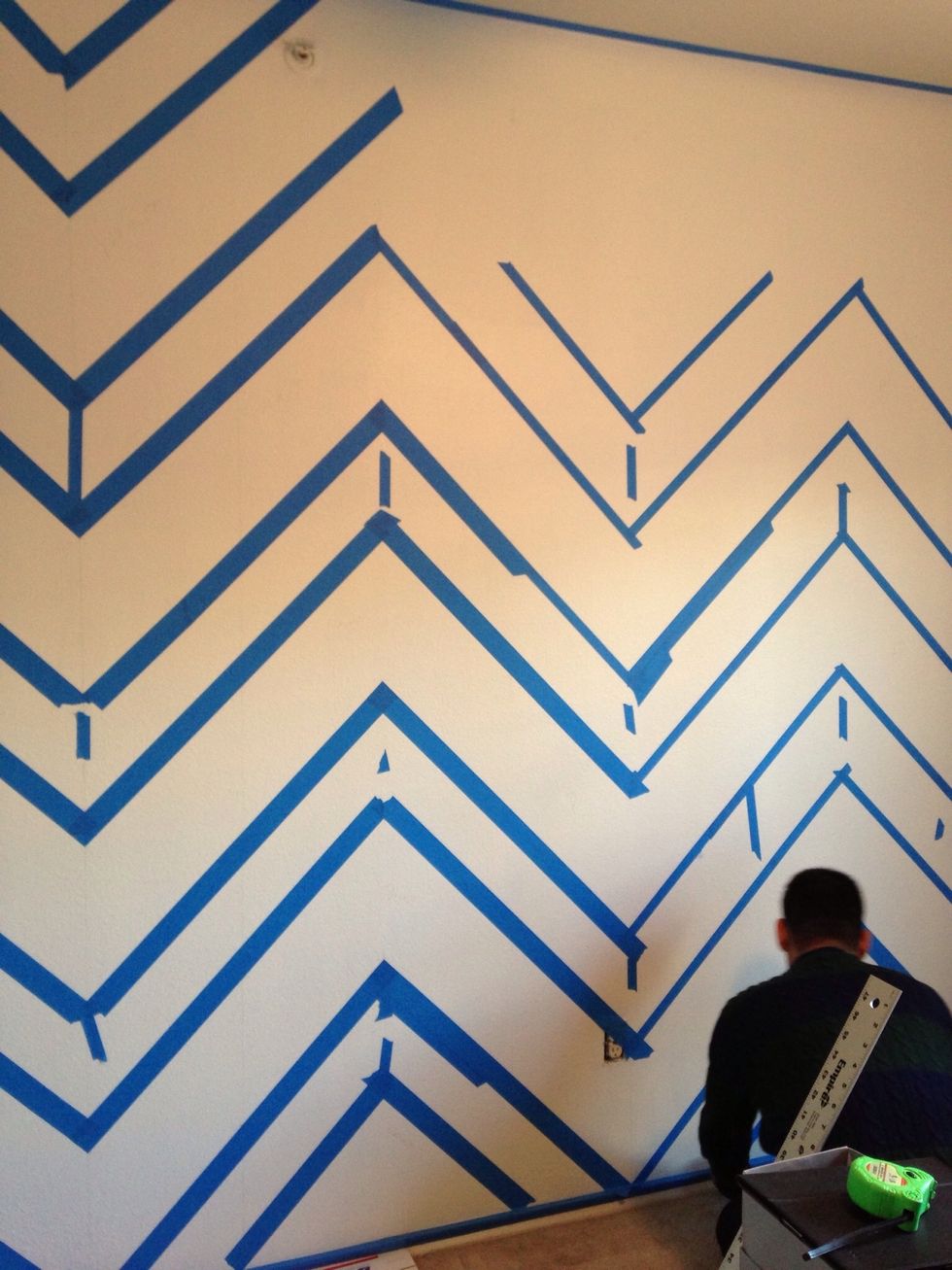 Now comes the tricky part. You need to mark which areas are going to be painted and which aren't. Then, completely tape off the area you don't want to paint.