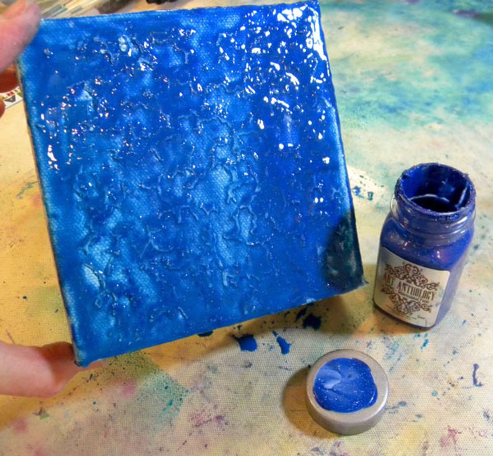 Now cover the canvas with Honolulu Blue Sorbet, which will add shimmer to the background.  Set aside to dry completely.