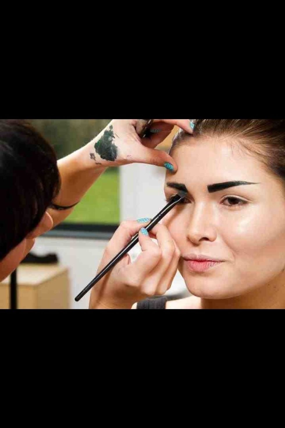 Now create your desired eyebrow shape. I have used a gel eyeliner to create these eyebrows...