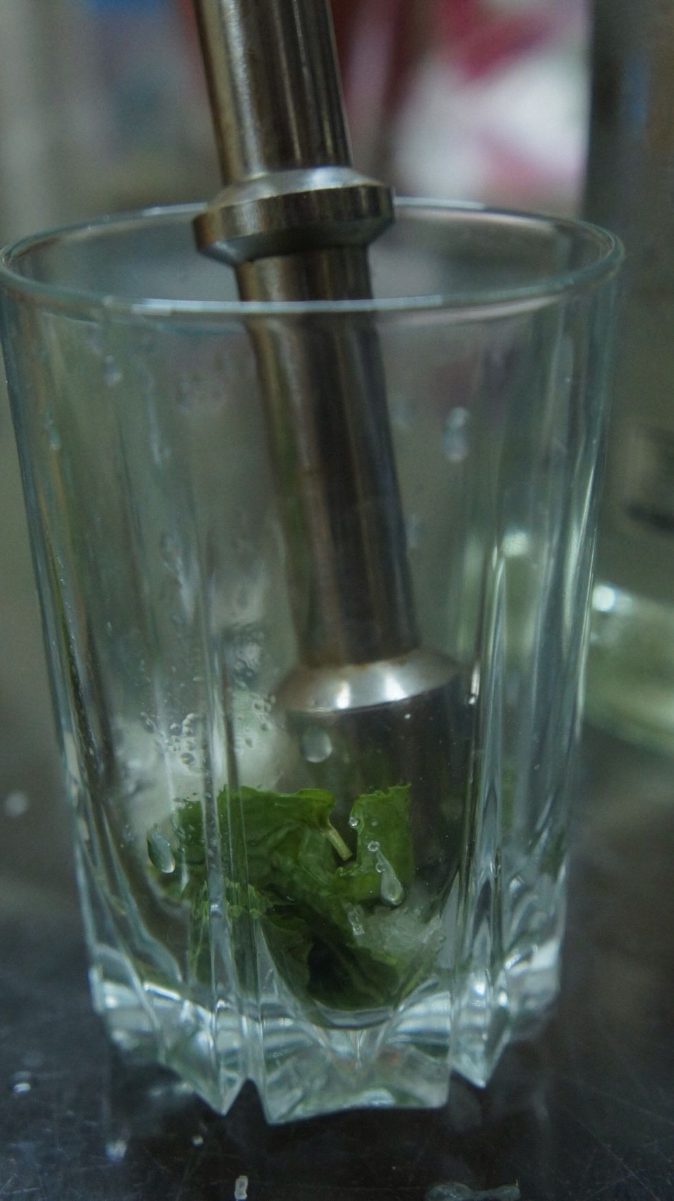 Now crush the mint leaves, sugar and lime juice...