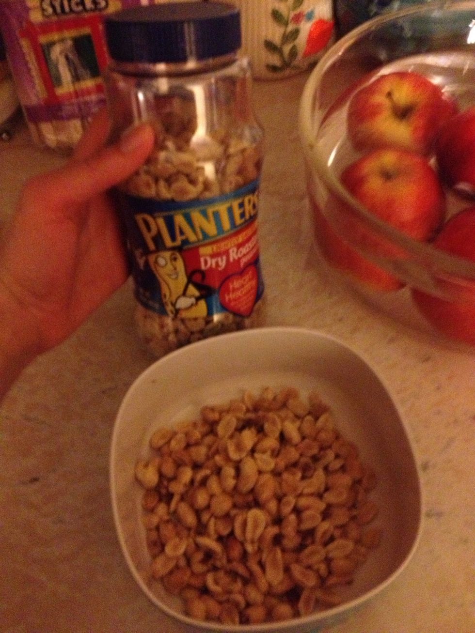 Now crush the peanuts. You can use a grinder or put them in a plastic bag and use a rolling pin and smash it in the plastic bag. Anything you have in the house that can smash the peanut.