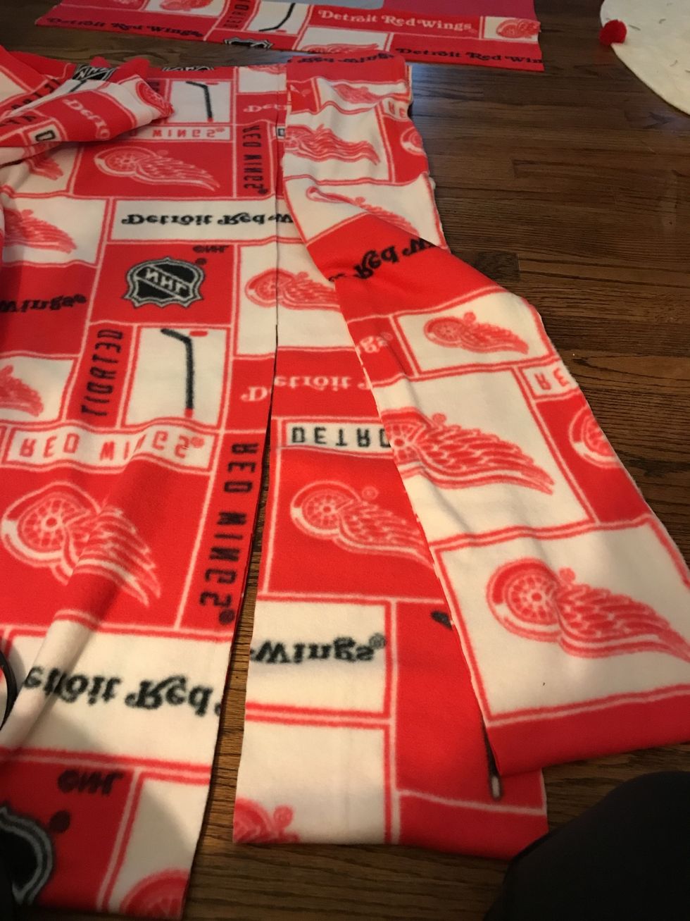 Now, cut 2 long strips of fleece for the sides. Make the strips about 6" wide.