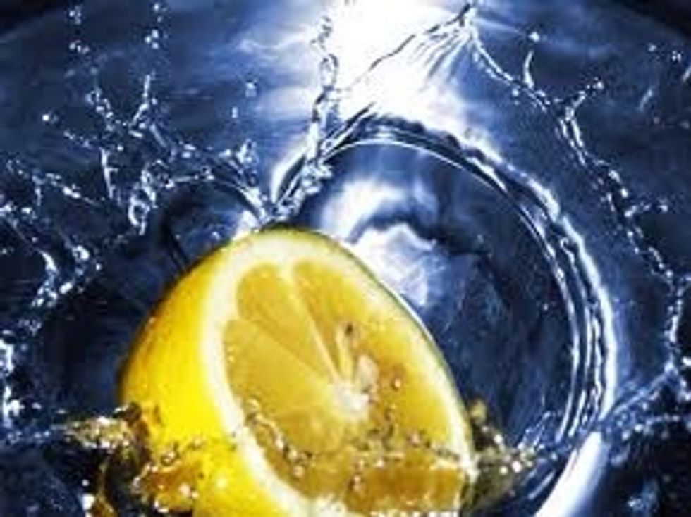 Now cut a fresh lemon and squeeze it. ( into your bowl of milk)