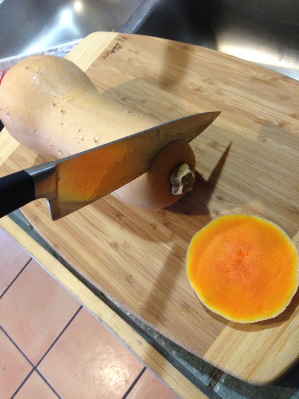 Now cut off the head. Use both hands here too.
