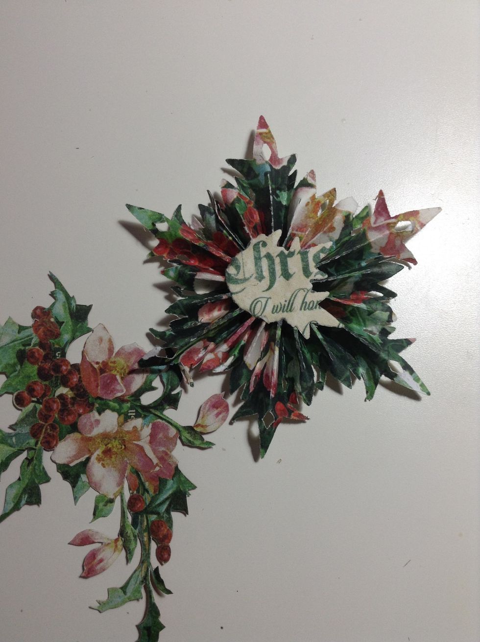Now, cut some flowers and glue to the snowflake.