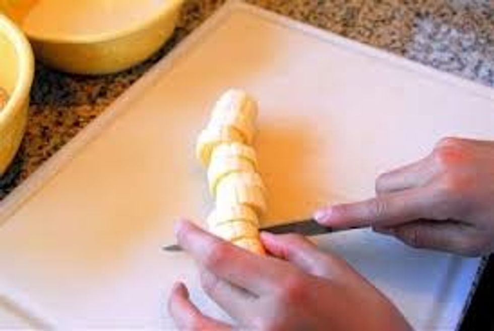 now cut the bananas medium sized pieces