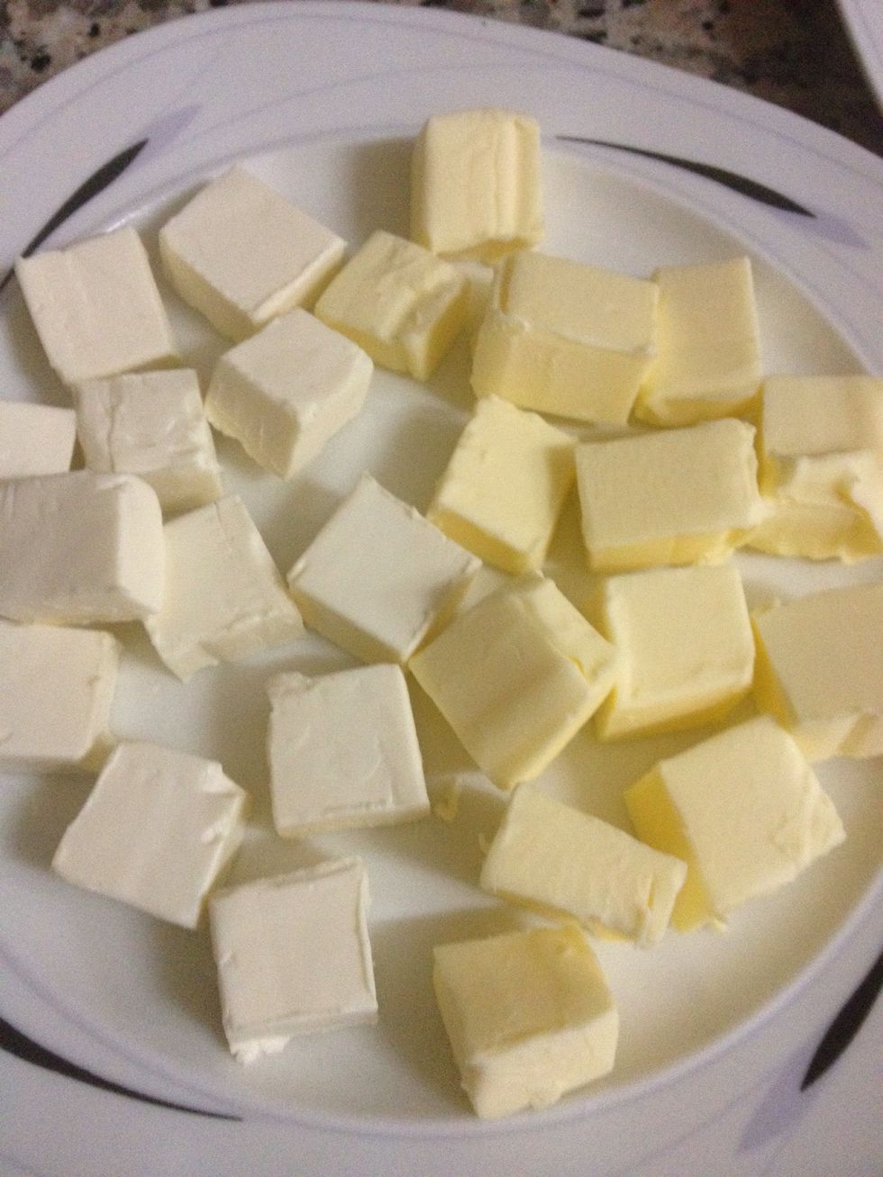 Now cut the butter and cream cheese into cubes, I prefer them large