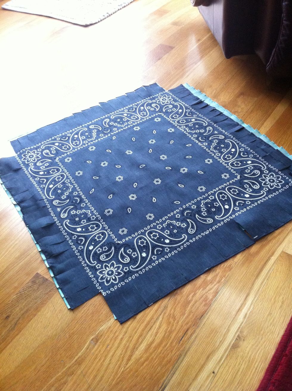 Now cut the sides of the fabric on all sides into little strips about an inch wide