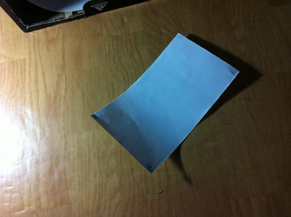 Now cut two small pieces of paper to fit the sides of the shoe box.