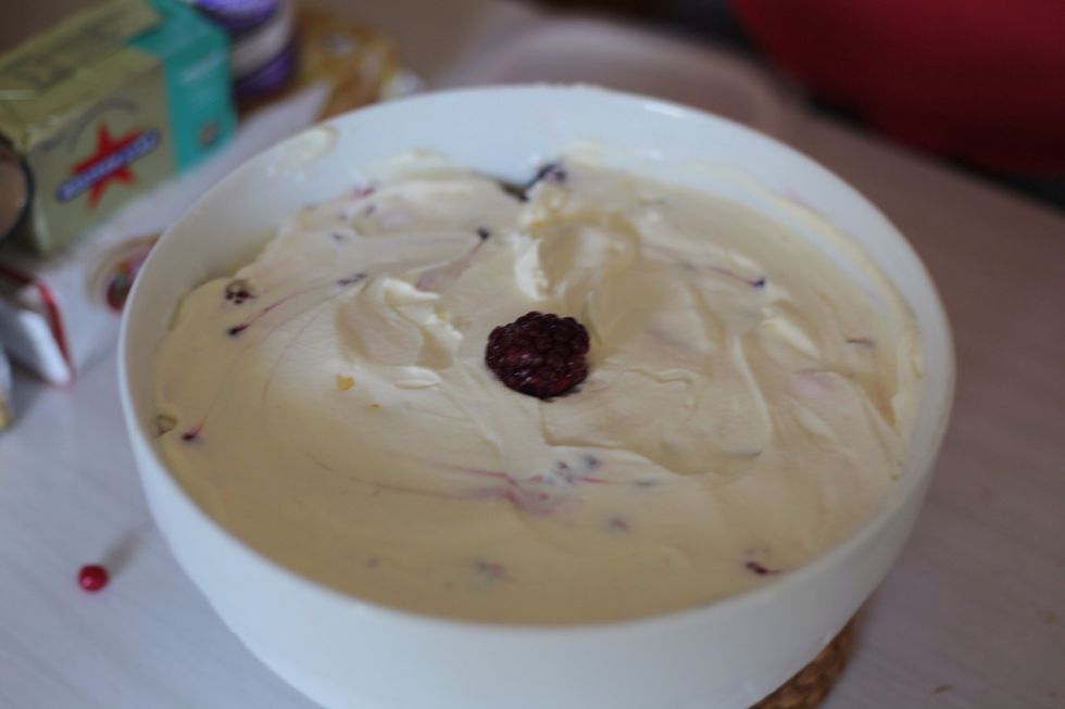 Now decorate with the balance of the berries. Plop...