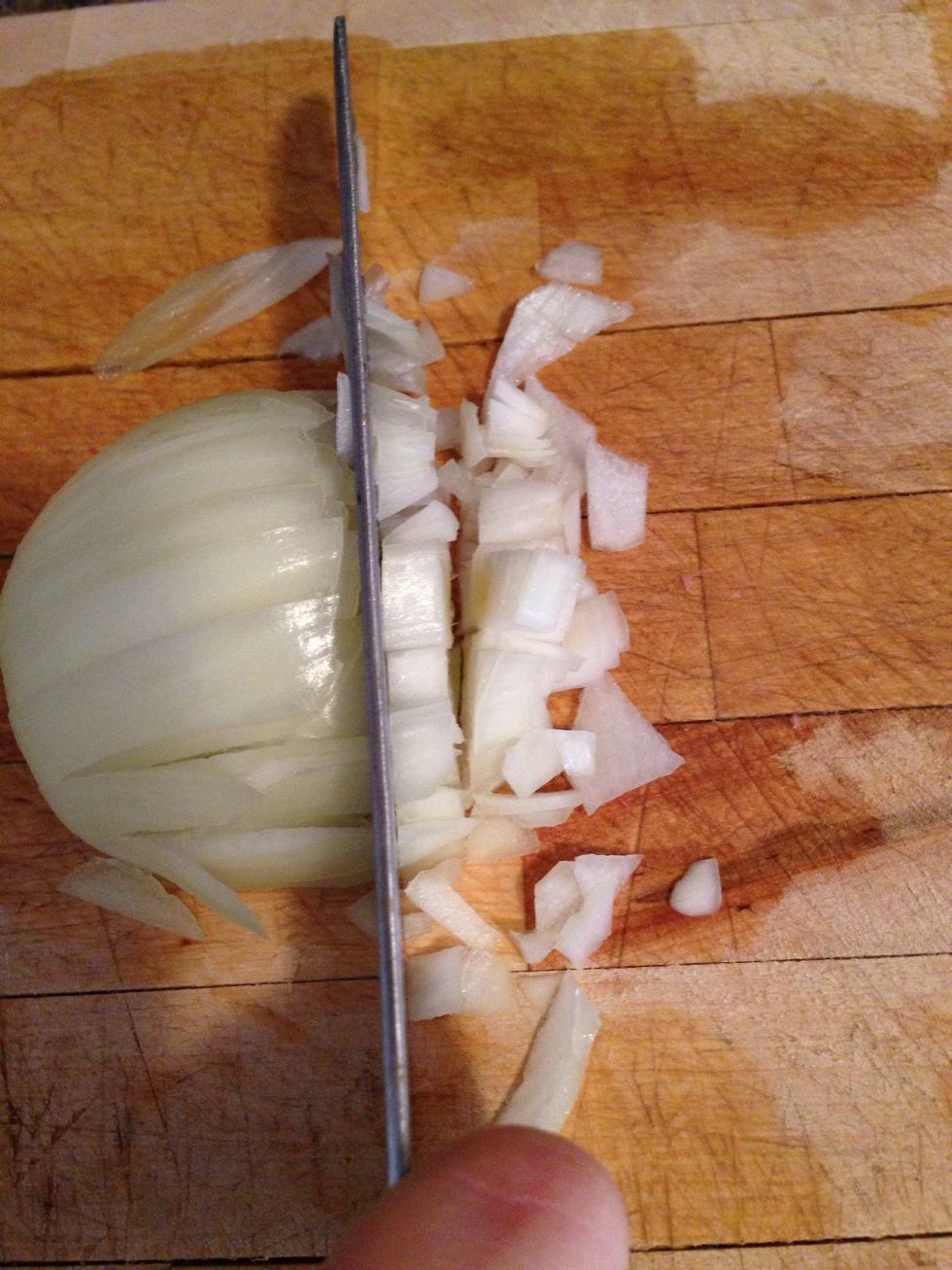 Now dice. That cutting method makes perfect size cubes of onions in half the time!