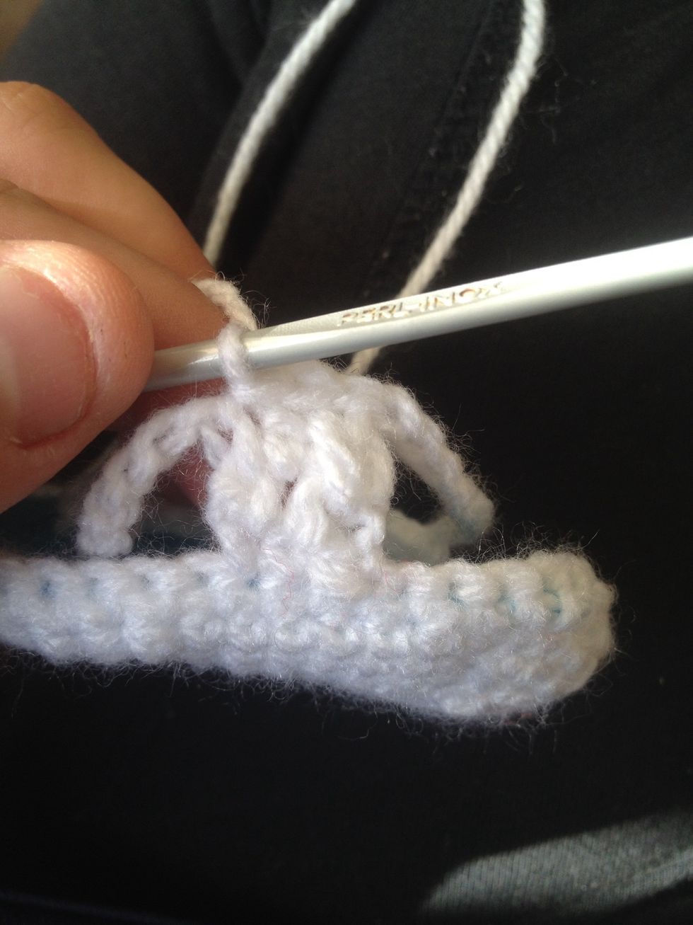 Now do 2 slip stitches into the next 2 stitches. DO NOT CUT YARN and FASTEN OFF