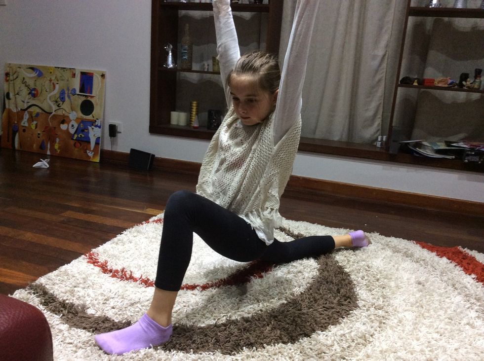 Now do a lunge to both legs TIP: if you hold your hands up it will help stretch more so if you want to get you splits a little more quicker it would be recommended but is optional!