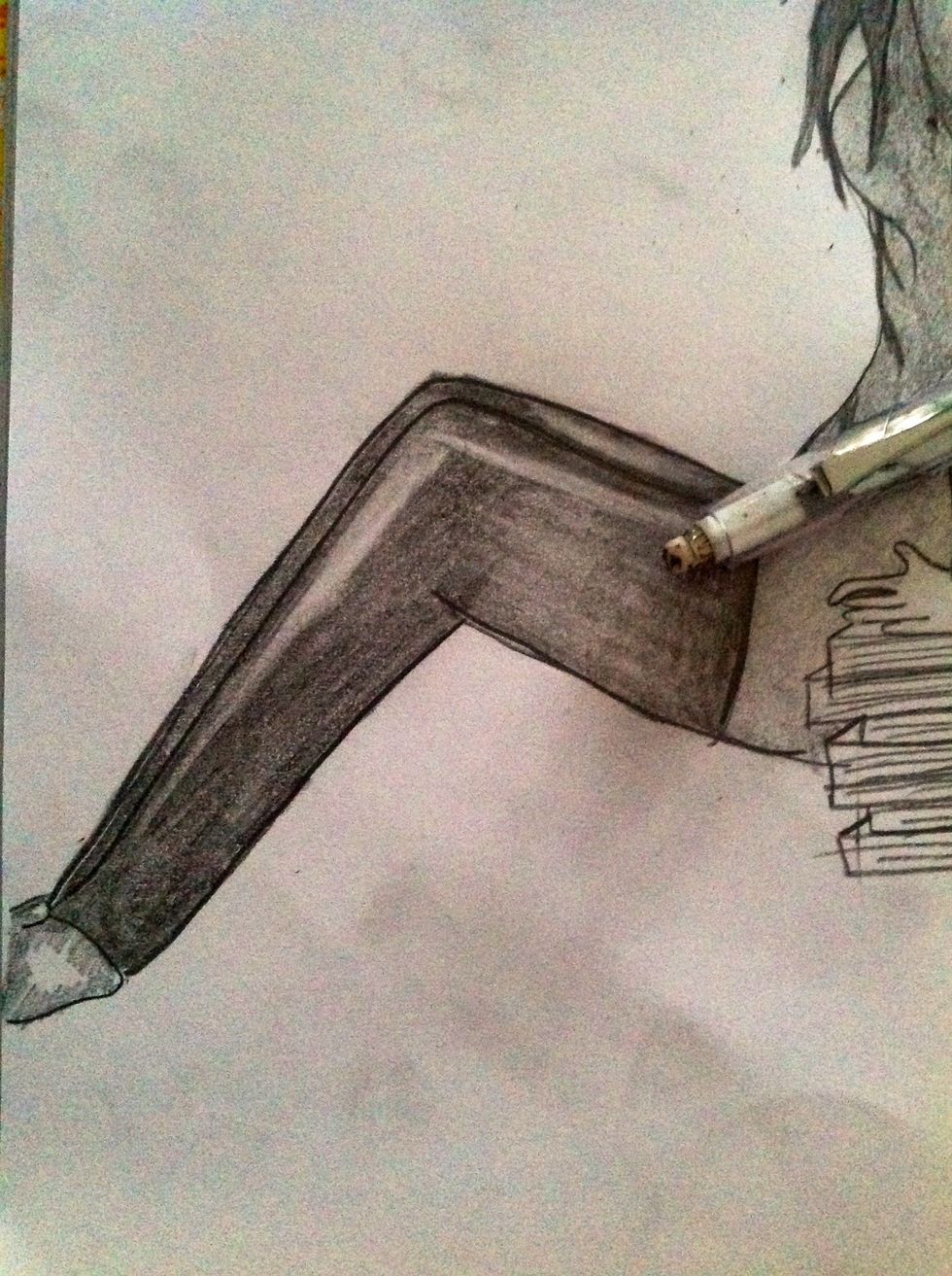 Now do some white shadow on the trouser by using the eraser....