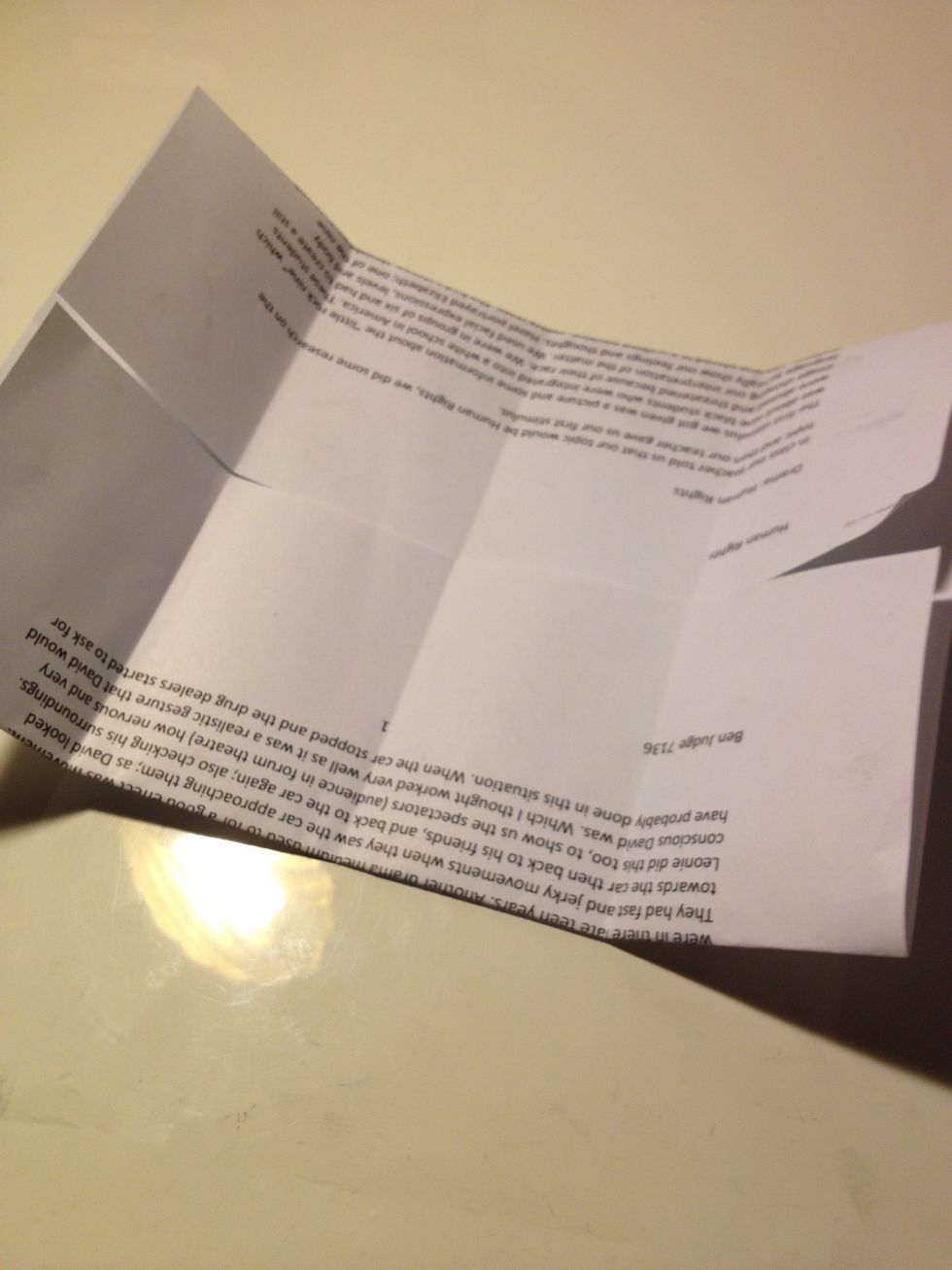 Now do the same as before and fold the paper in half and then each half folded to the middle crease.