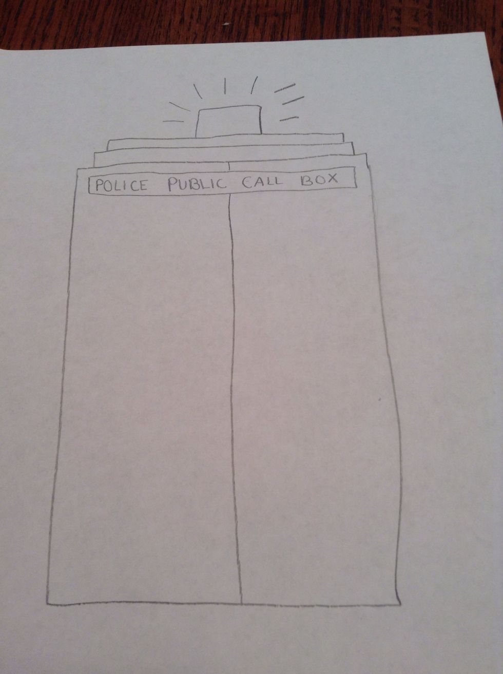 Now draw a line down the center of the large rectangle.