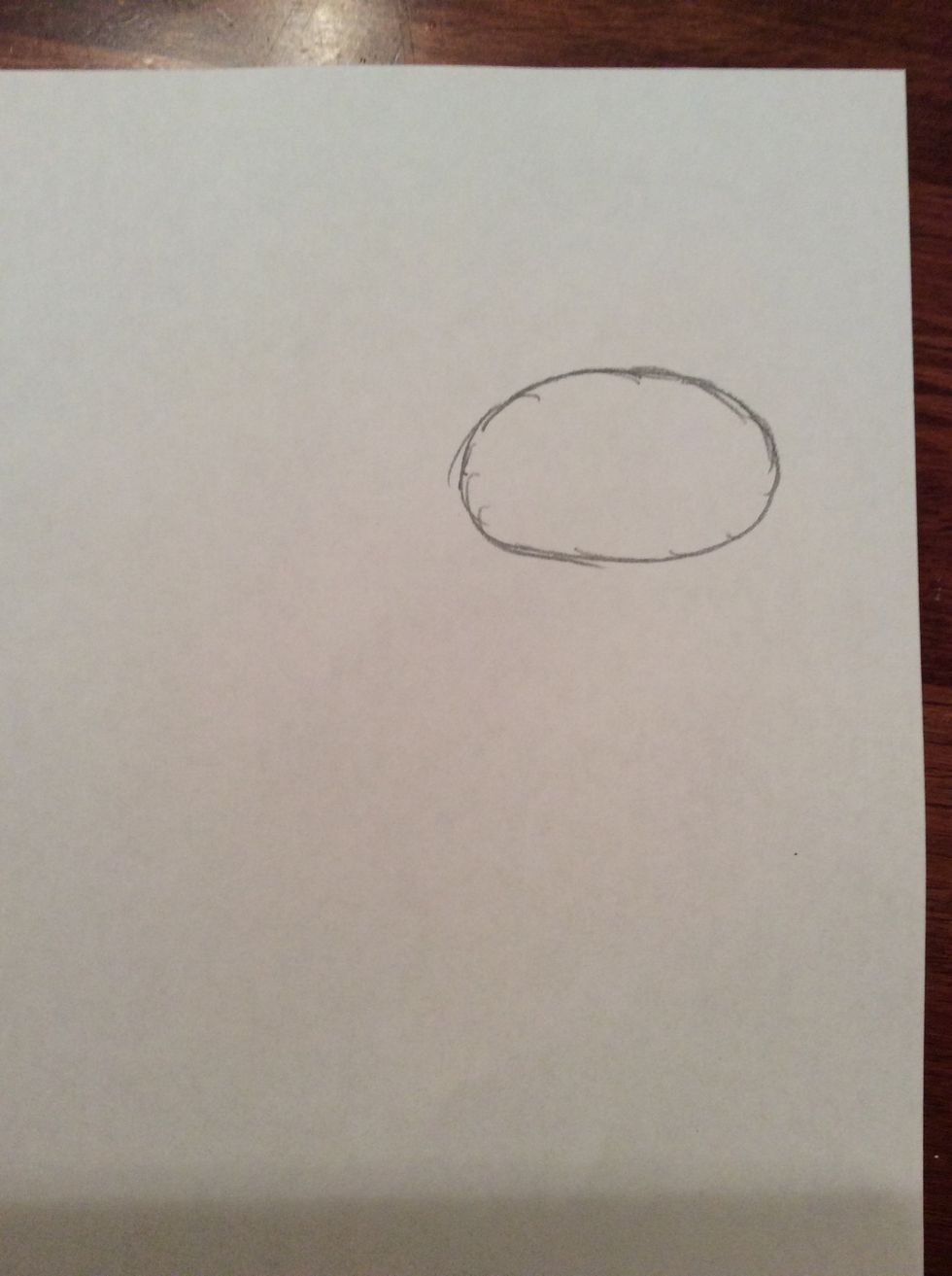 Now draw a medium sized oval using the markings to guide you.