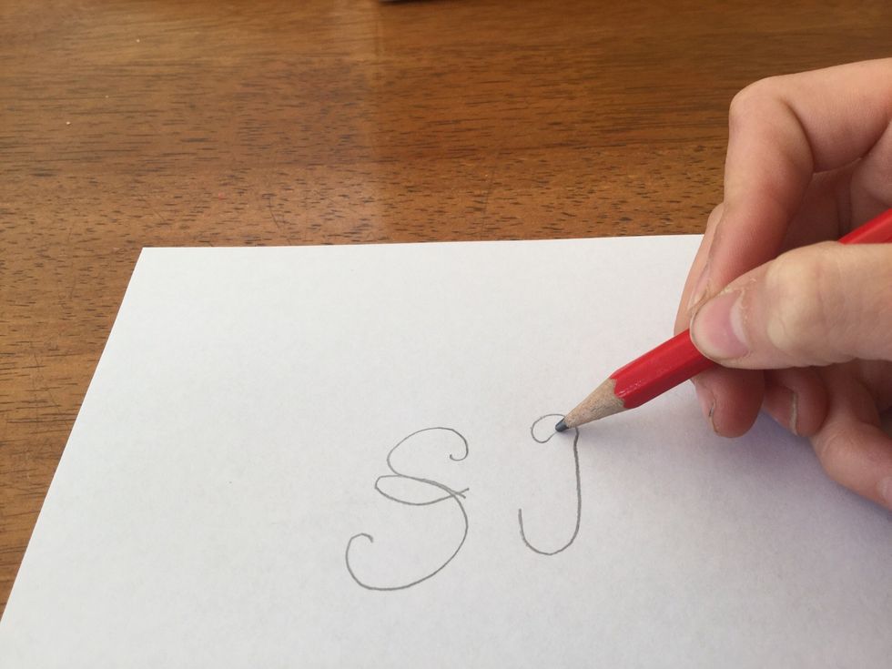 Now draw a small loop starting where you just finished