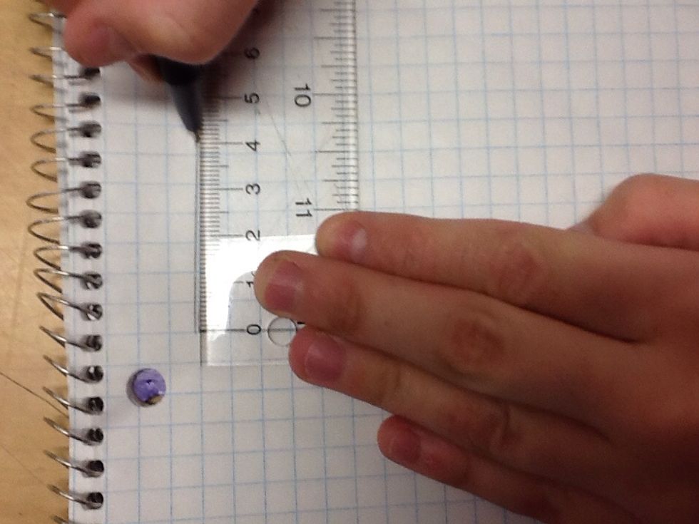 Now draw a vertical line measuring approximately 4 centimetres long.