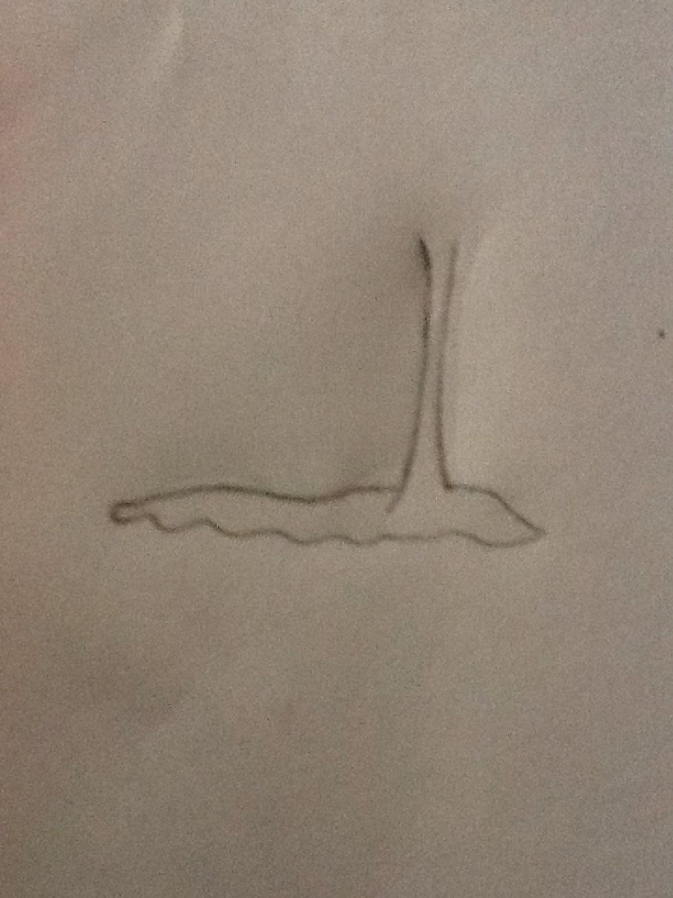 Now draw a wavy line on the bottom to finish off his body.